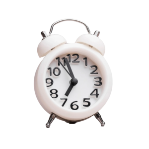 close-up-white-alarm-clock-colored-backdrop